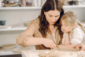 portrait mother little girl shaping clay together crcf038414f size10.53mb 6000x4000 - title:Home - اورچین فایل - format: - sku: - keywords: p_id:18