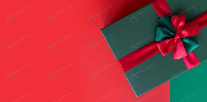 present box christmas holiday green red backgroun crcedd69376 - title:جعبه هدیه با روبان قرمز - اورچین فایل - format:JPG - استوک - sku:crcedd69376 - keywords: p_id:82229