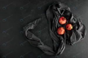 red pomegranates black tablecloth top view crccc506d09 size12.46mb 6000x4000 - title:Home - اورچین فایل - format: - sku: - keywords: p_id:18