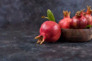 red pomegranates wooden platter marble table crc01ad3e60 size10.69mb 6000x4000 - title:Home - اورچین فایل - format: - sku: - keywords: p_id:18