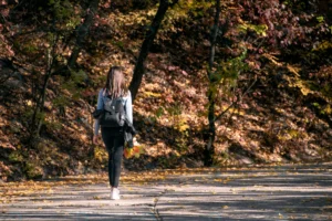 sad young woman is walking along alley autumn par crc262d22c7 size5.44mb 3200x2133 - title:Home - اورچین فایل - format: - sku: - keywords: p_id:18