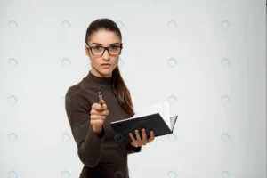 serious businesswoman pointing you hold notebook crca0540e6f size0.12mb 1920x1281 - title:Home - اورچین فایل - format: - sku: - keywords: p_id:18