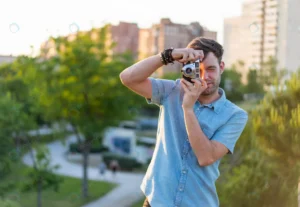 shallow focus shot young male taking photo park crcd3f8f141 size13.99mb 5792x4000 1 - title:Home - اورچین فایل - format: - sku: - keywords: p_id:18