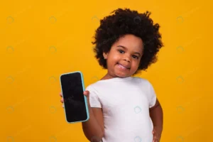 small afro child girl holding phone pointing isola rnd684 frp20878648 - title:Home - اورچین فایل - format: - sku: - keywords: p_id:18