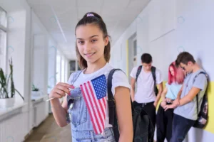 student teenager girl with usa flag inside school rnd684 frp28360100 - title:Home - اورچین فایل - format: - sku: - keywords: p_id:18