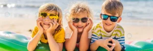 three blond kids sunglasses are lying beach banne crc3995e939 size4.45mb 6000x2000 - title:Home Main - اورچین فایل - format: - sku: - keywords: p_id:18