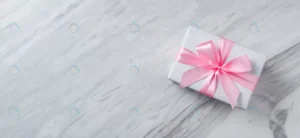 top view gift box with pink ribbon white marble crc171e8615 size4.22mb 5971x2745 - title:Home - اورچین فایل - format: - sku: - keywords: p_id:18