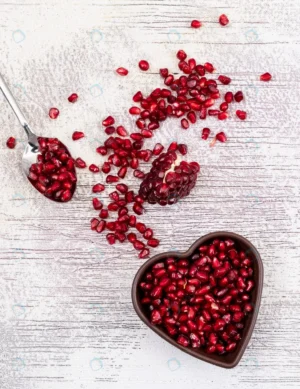 top view pomegranate seeds heart shaped plate whi crcd93f0b38 size18.41mb 4437x5755 - title:Home - اورچین فایل - format: - sku: - keywords: p_id:18