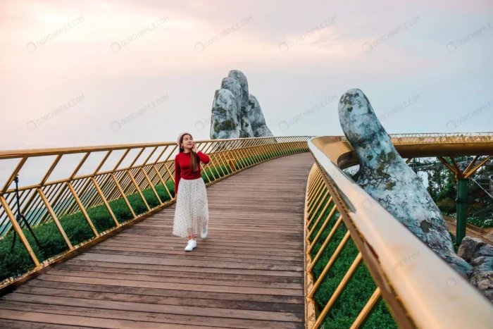 travel woman golden bridge ba na hills danang vie crc44b7c8e0 - title:زن جوان روی پل طلایی ویتنام - اورچین فایل - format:JPG - استوک - sku:crc44b7c8e0 - keywords: p_id:99455