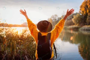 traveler with backpack relaxing by autumn river s crcfe187b19 size7.80mb 5479x3653 - title:Home - اورچین فایل - format: - sku: - keywords: p_id:18