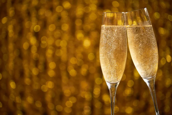 two glasses champagne shiny bokeh effects crc85a8f839 - title:تصویر لیوان شیشه ای با پس زمینه بوکه - اورچین فایل - format:JPG - استوک - sku:crc85a8f839 - keywords: p_id:98107