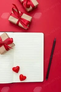 valentine s day mock up open notebook with red hearts gift boxes red background copy space text - title:Home - اورچین فایل - format: - sku: - keywords: p_id:18