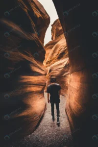 vertical shot man walking through red canyon tunne rnd671 frp28363220 - title:Home - اورچین فایل - format: - sku: - keywords: p_id:18