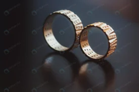 wedding rings captured with reflection surface crc2032b296 size2.76mb 3800x2533 1 - title:Home Main - اورچین فایل - format: - sku: - keywords: p_id:18