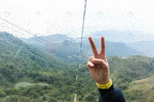 woman showing victory sign v sign cable car nong crcc405667e size9.24mb 5472x3648 - title:Home - اورچین فایل - format: - sku: - keywords: p_id:18