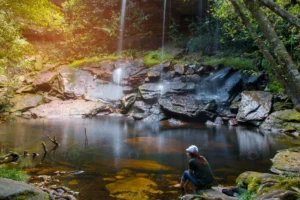 woman sitting rock looking waterfall crc721722fd size13.68mb 5472x3648 - title:Home - اورچین فایل - format: - sku: - keywords: p_id:18