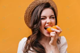 woman straw hat white top bites orange with eyes crc91d92a0b size11.75mb 6720x4480 - title:Home Main - اورچین فایل - format: - sku: - keywords: p_id:18