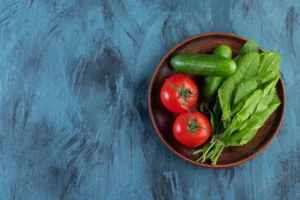 wooden plate fresh tomatoes cucumbers greens blue crcdf018368 size18.09mb 6000x4000 - title:Home - اورچین فایل - format: - sku: - keywords: p_id:18