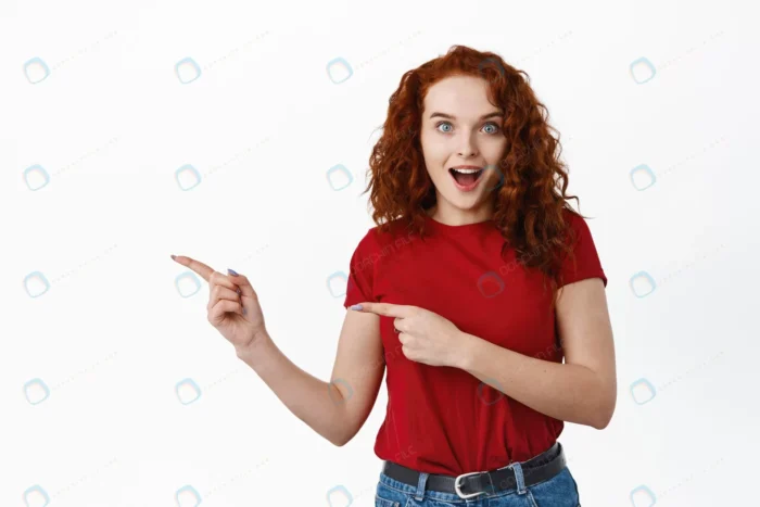 wow look there excited redhead european woman wit crc072283de - title:دختر در حال اشاره به فرصتی شگفت انگیز - اورچین فایل - format:JPG - استوک - sku:crc072283de - keywords: p_id:65321