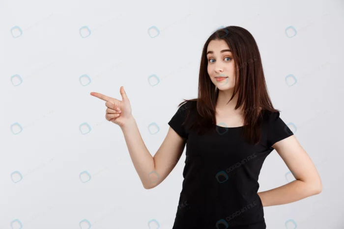 young beautiful girl black t shirt pointing finge crc4447b38c - title:استوک دختر با چشمهای رنگی در حال اشاره - اورچین فایل - format:JPG - استوک - sku:crc4447b38c - keywords: p_id:65325
