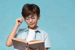 young boy reading with copy space crc292c74cc size15.36mb 7360x4912 - title:Home - اورچین فایل - format: - sku: - keywords: p_id:18