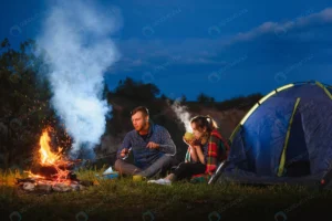 young couple having rest bonfire beside camp blue rnd346 frp9150168 - title:Home - اورچین فایل - format: - sku: - keywords: p_id:18