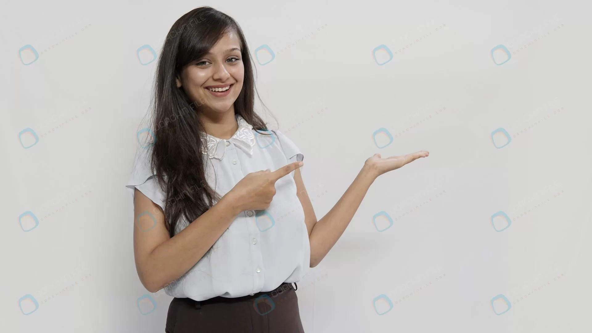 young indian business woman pointing with index f crc6e2f8dfb - title:Home Main - اورچین فایل - format: - sku: - keywords: p_id:18