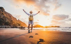 young man arms outstretched by sea sunrise enjoyin rnd311 frp7641068 - title:Home - اورچین فایل - format: - sku: - keywords: p_id:18