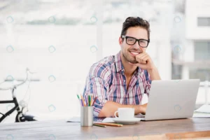 young man sitting his desk crc68006875 size7.75mb 5760x3840 1 - title:Home - اورچین فایل - format: - sku: - keywords: p_id:18